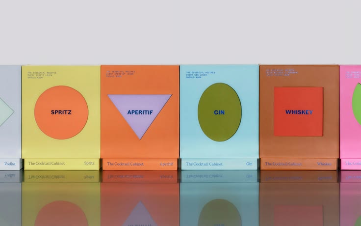 These cocktail recipe packs hide a gradient behind a die-cut