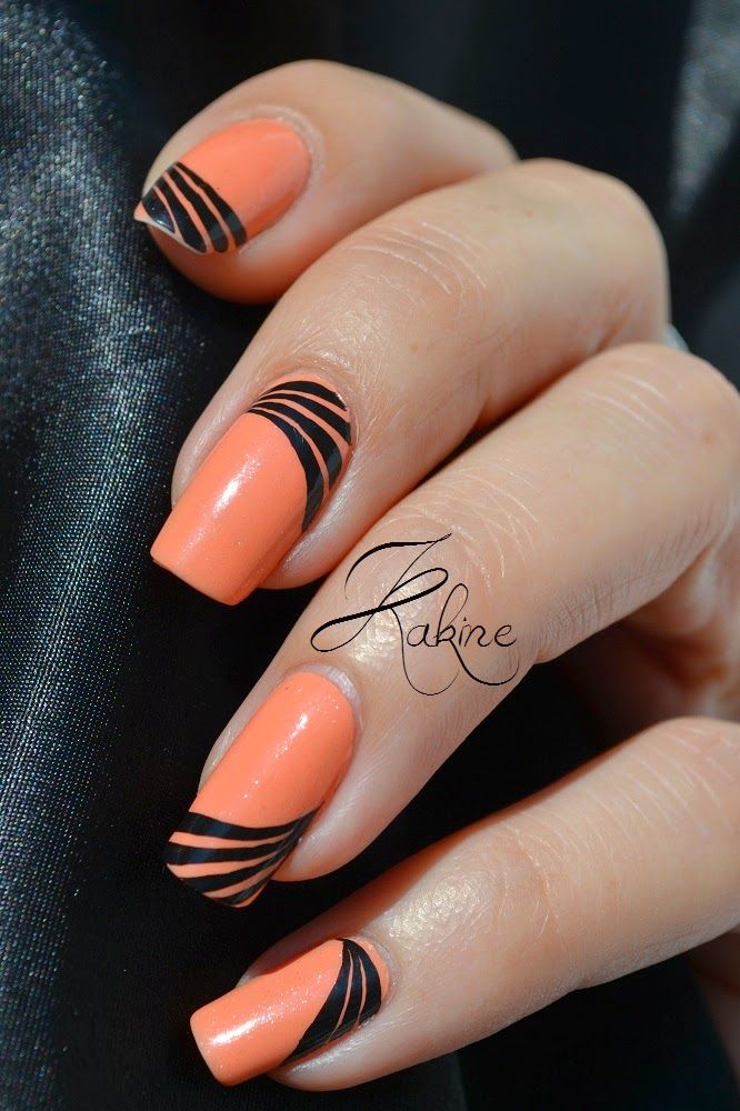 Orange and black polish ... this nail design is everything!