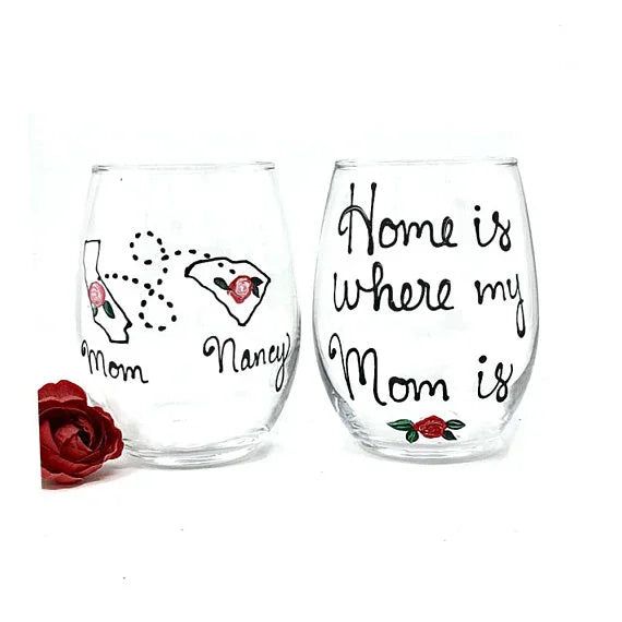 Beautiful hand-painted wine glass featuring 'Home is Where M