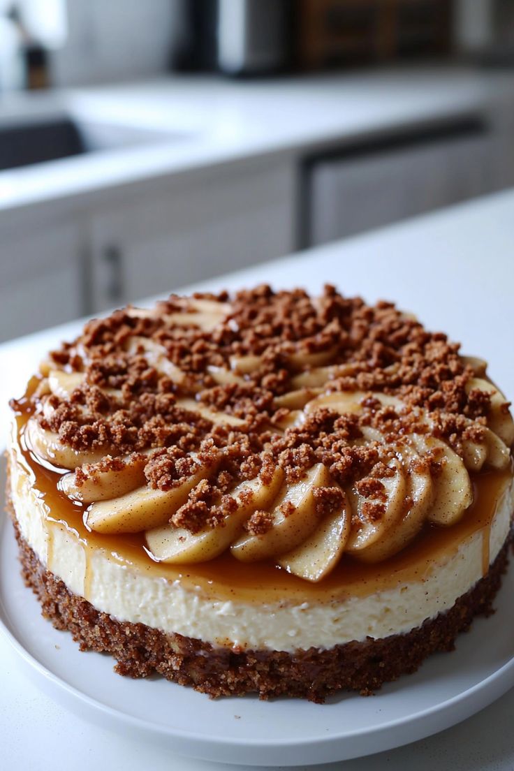 This Apple Crumble Cheesecake features a creamy cheesecake b
