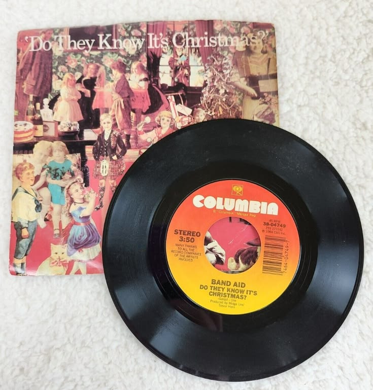 Check out “DO THEY KNOW IT'S CHRISTMAS?/FEED THE WORLD" - 19