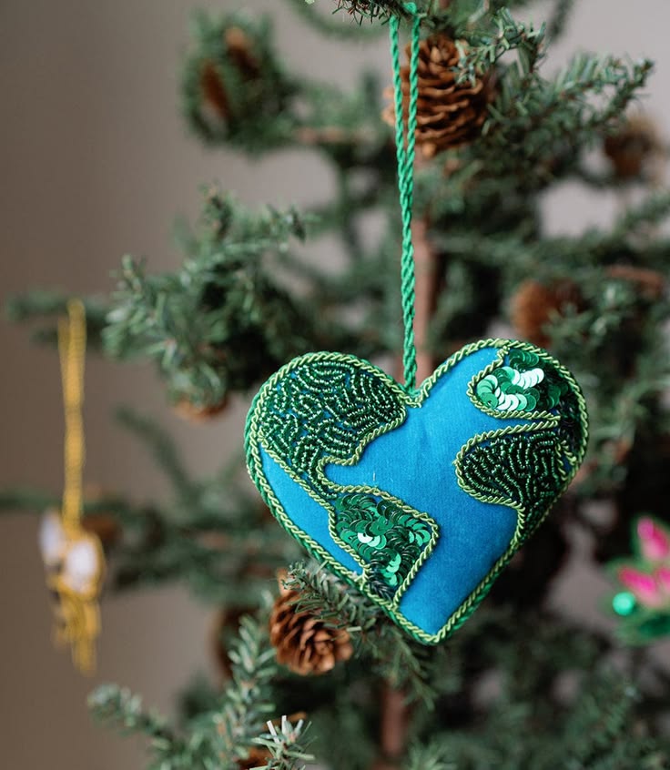The Larissa Plush Heart Earth Beaded Felt Ornament features 