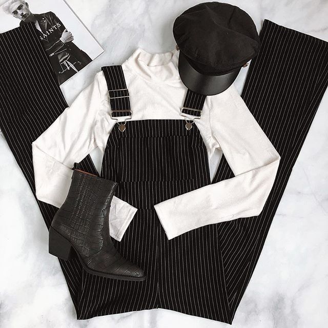 Turtle neck white crop top is a winter fashion essential. Pe