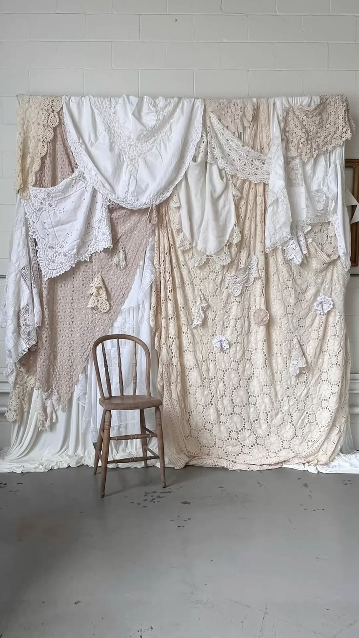 photo backdrop made with vintage crochet and linen tableclot