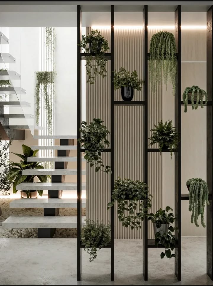 A sophisticated floor-to-ceiling black frame divider featuri
