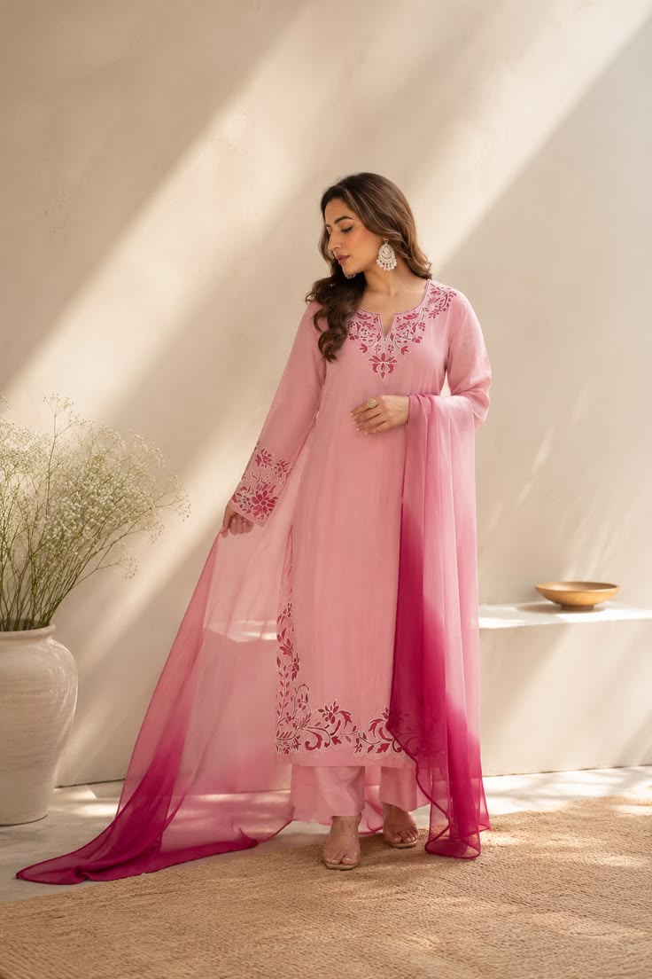 A dreamy pink kurta set styled with delicate floral embroide