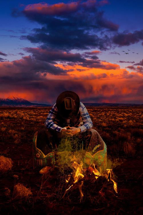 Lone cowboy sunset outdoors nature clouds fire desert countr
