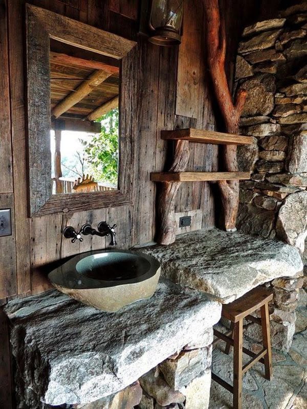 Transform your bathroom into a rustic haven with stone walls