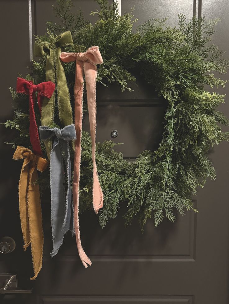 Christmas wreath with velvet bows that i purchased from hobb