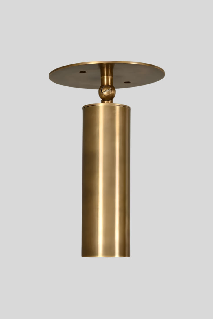 Bring warm metallic character to your space with this mid ce