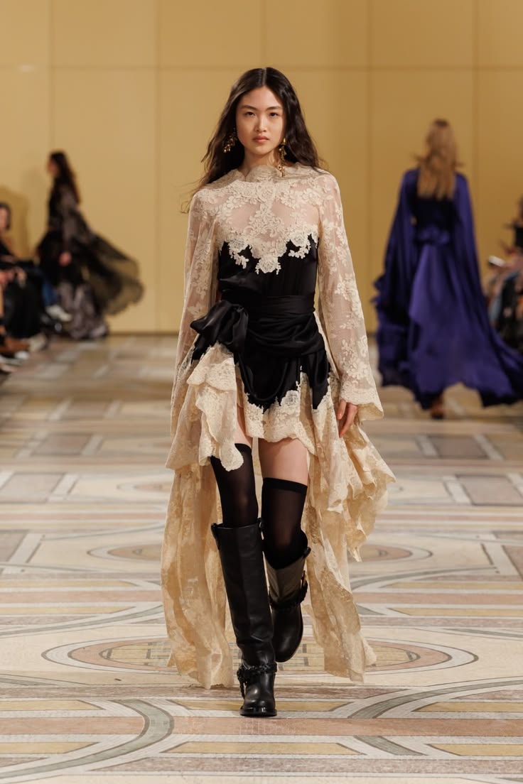 Explore bold hi-fashion outfits and elegant runway looks. Di