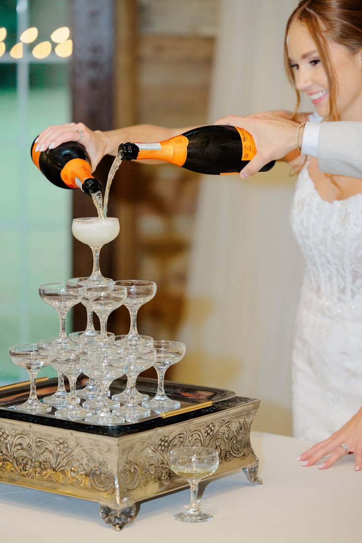 Fun wedding reception ideas like a champagne tower can make 