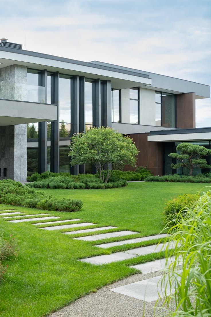 A contemporary house with a stepping stone path crossing the