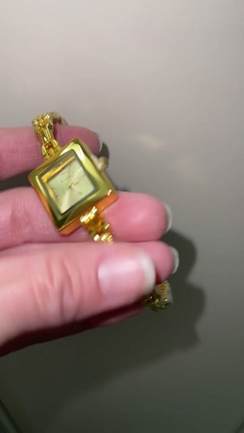 Check out this video Elegant Hunruy Gold Bracelet Watch from
