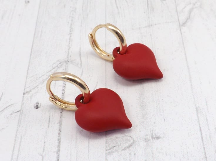 A bold pop of red meets the warm glow of gold. These sweet, 