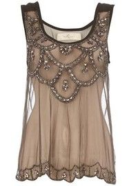 Rise Embellished mesh vest with a round neckline. Length fro