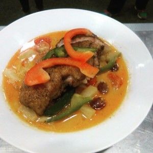 Crispy Duck Breast over a Red Thai Curry Sauce