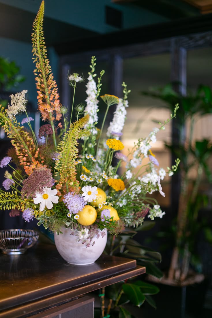 A large, fine-textured, neutral-colored, summery floral arra