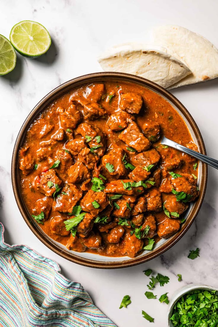 Carne guisada is a flavorful Latin stew with juicy beef slow