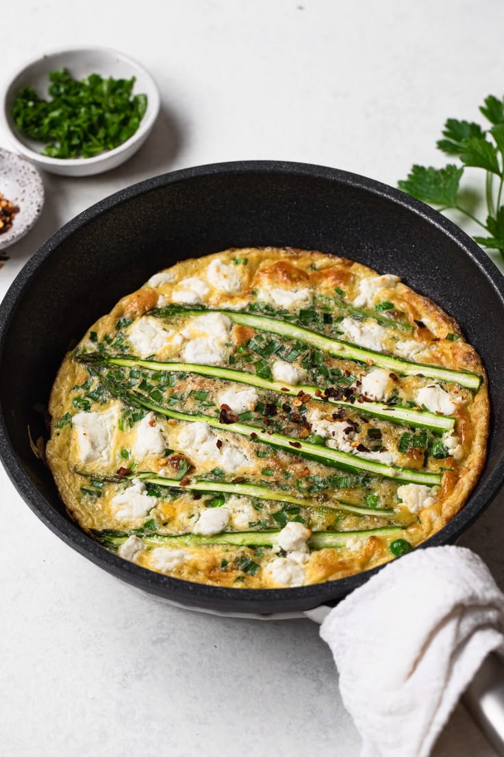 A quick and easy vegetarian omelette packed with fresh aspar