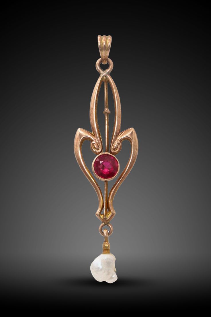 Discover the elegance of this Antique 10k Yellow Gold Ruby a