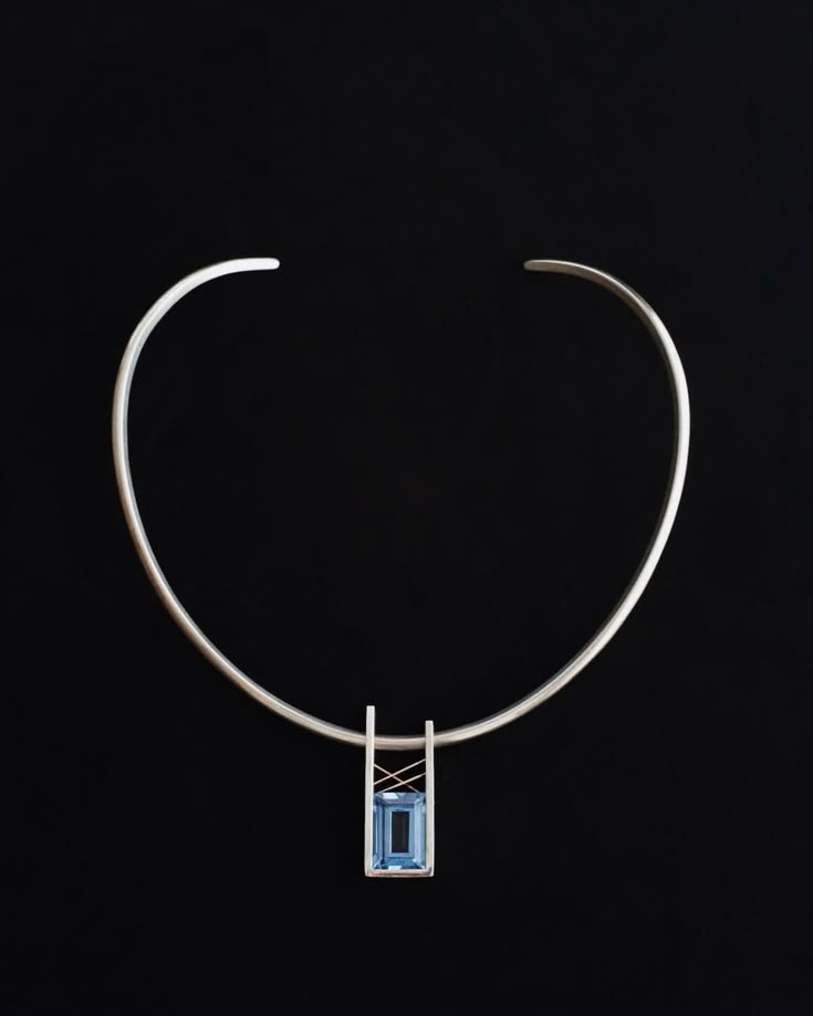 A sculptural Danish modernist neck-ring in sterling silver, 