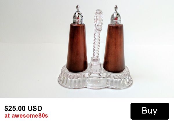 mid century modern salt and pepper shakers in a crystal cadd