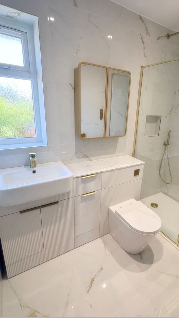 Dreaming of a timeless white and gold bathroom aesthetic? Th