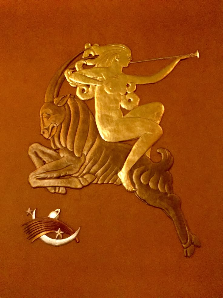 Gilded bas relief Diana