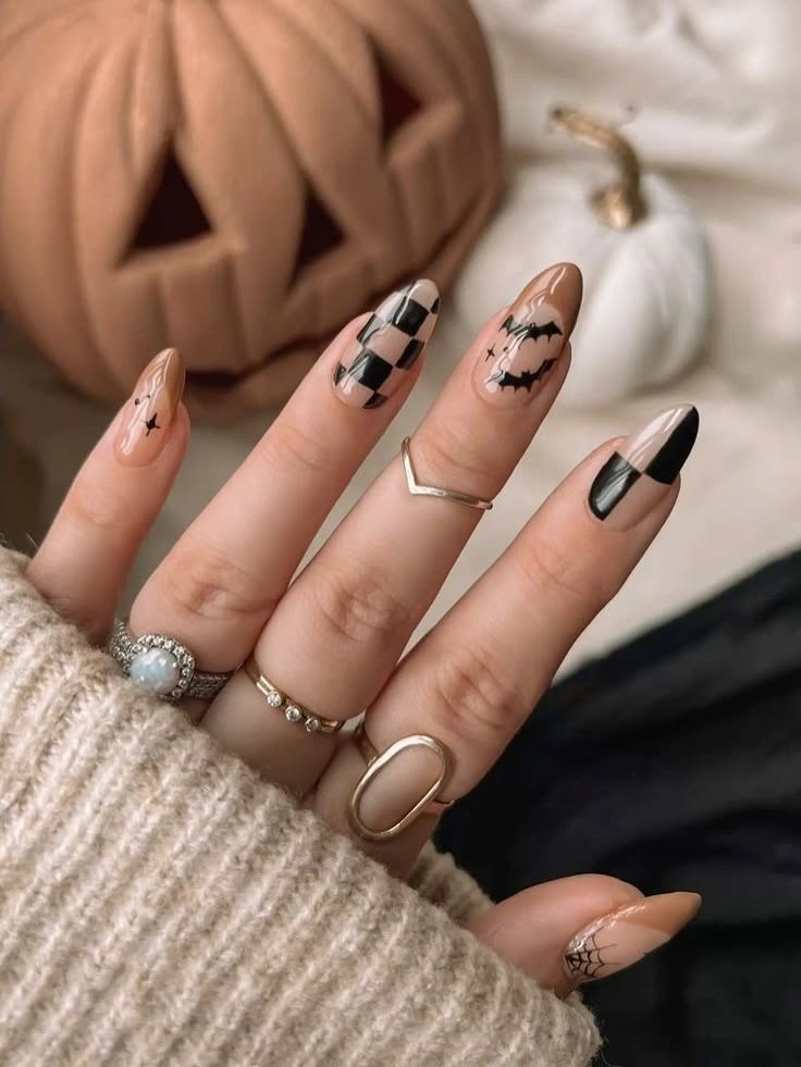 Elevate your fall look with these chic neutral almond nails!