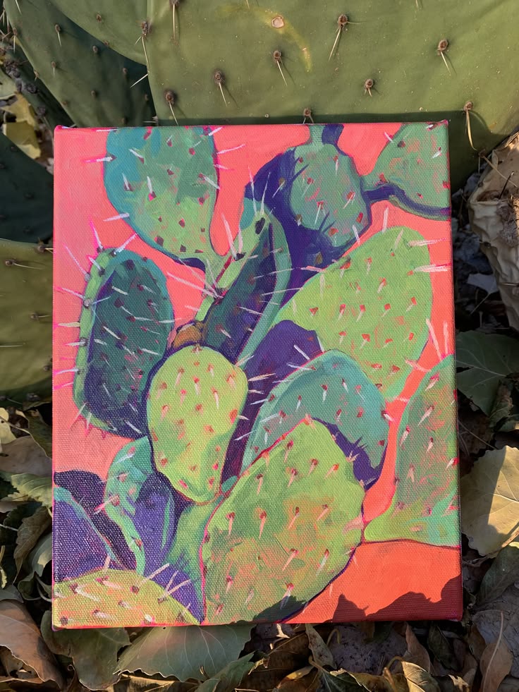 Small painting of a prickly pear cactus on terra cotta pink.