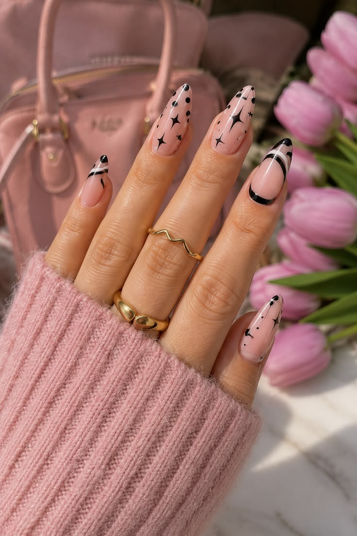 Discover elegant almond-shaped nails featuring glossy black 