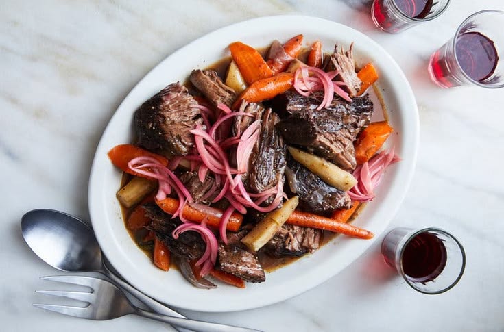 A hunk of beef slowly braised in red wine, herbs and garlic 