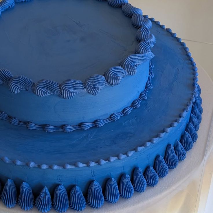 Bold and artistic, this royal blue textured buttercream cake