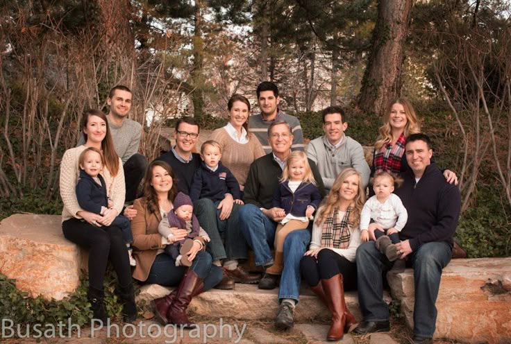 Larger family group pose + coordinating outfits (neutral/ear