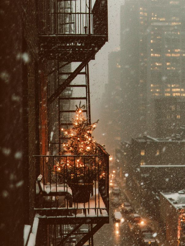 fire escape christmas tree shines 1990, decorated balcony, s