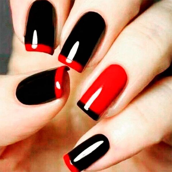 Cute black squoval French nails with red tips and an accent 