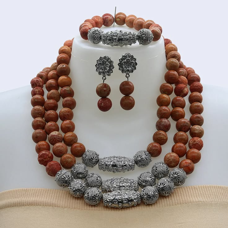 Material:Grass coralLength: about 18.5inchesStyle: African b