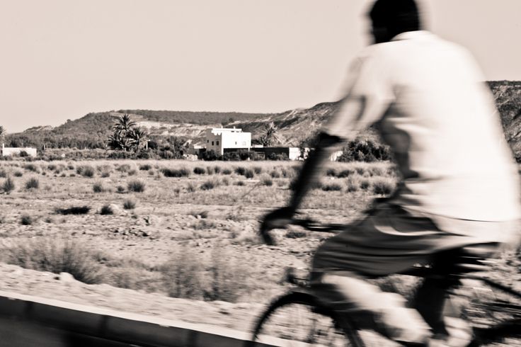 Man on bike by Hamza Nesrate on 500px