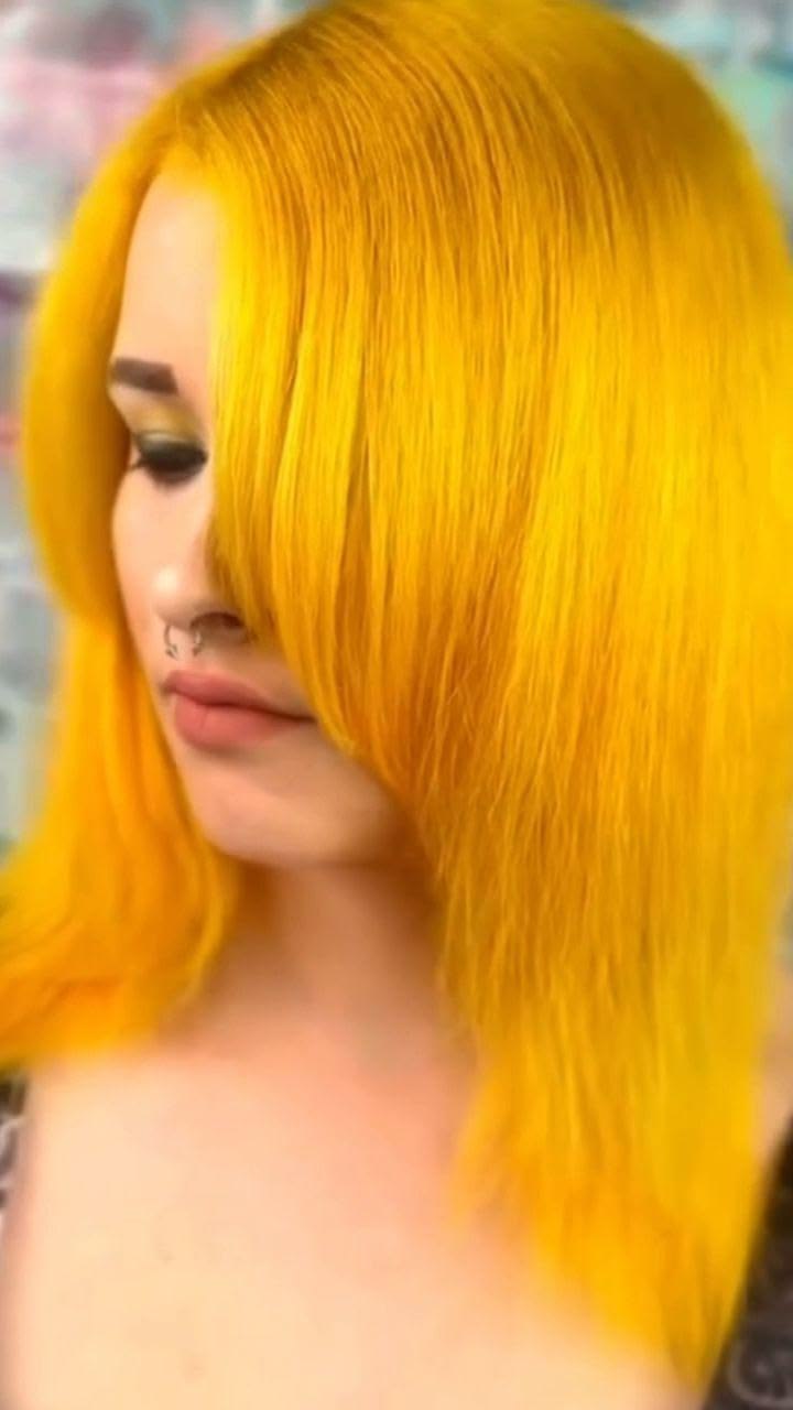 Embrace the golden glow of autumn with vibrant yellow hair! 
