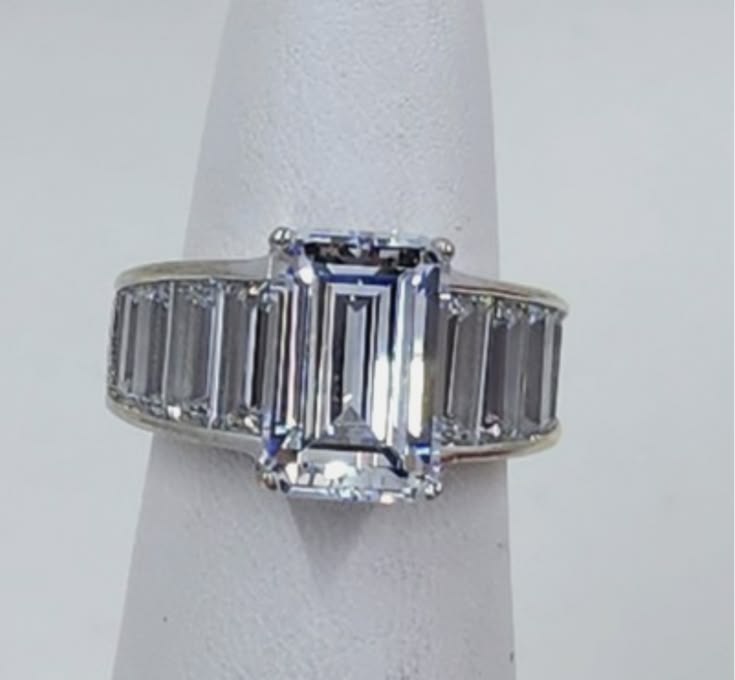 Center 4.50 carats; side 3.50 carats