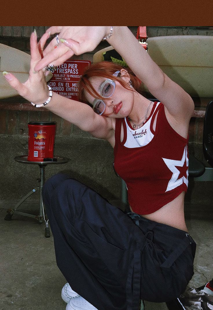 Shine bright in our Y2K Side Star Crop Top! Embrace the cele