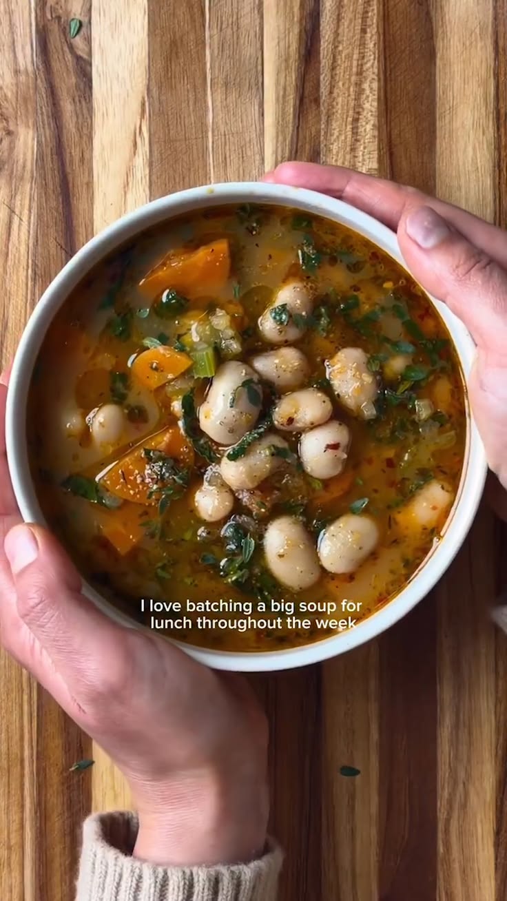 Creamy white beans simmered with garlic and herbs make this 