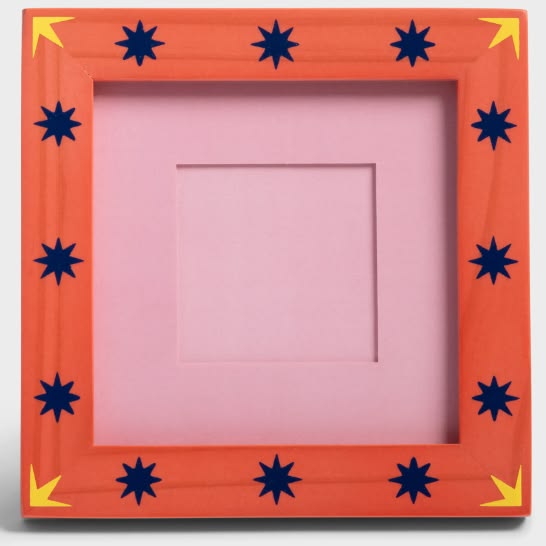 Inspired by vintage patchwork quilts, this bright photo fram