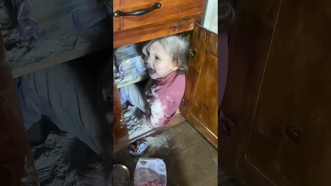 Toddler gets covered in flour inside cabinet in Buenos Aires, Argentina