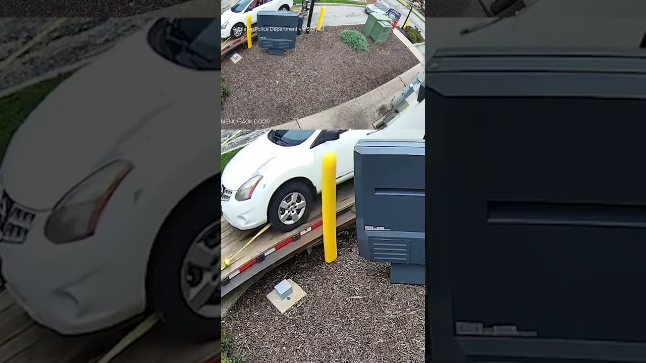Pickup truck towing car damages Taco Bell drive-thru