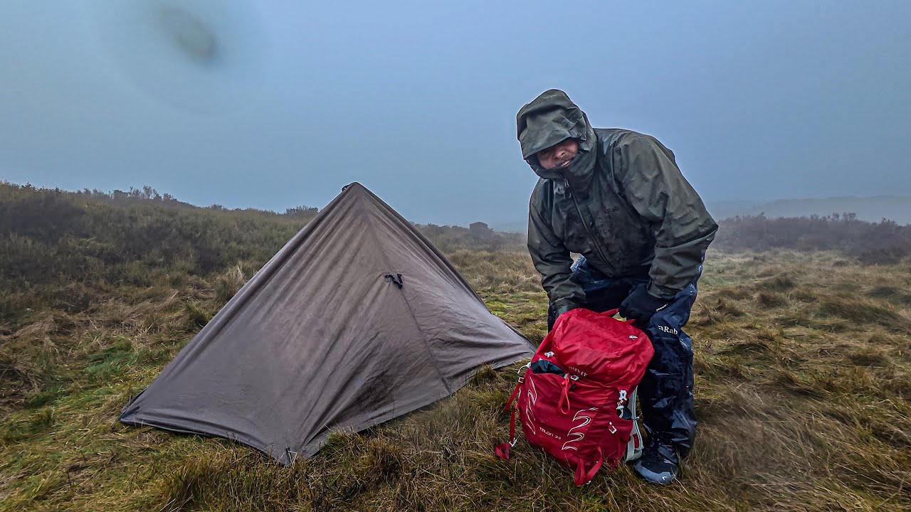 Storm Shelter Tarp Setup in Grim Weather