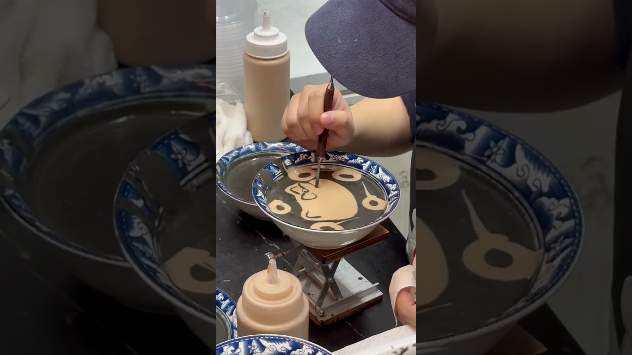 Intricate cat portrait crafted from sesame dessert in Nanning, China