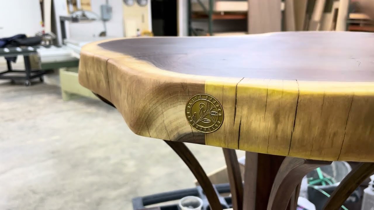 Finishing Emblem on Custom Wooden Table
