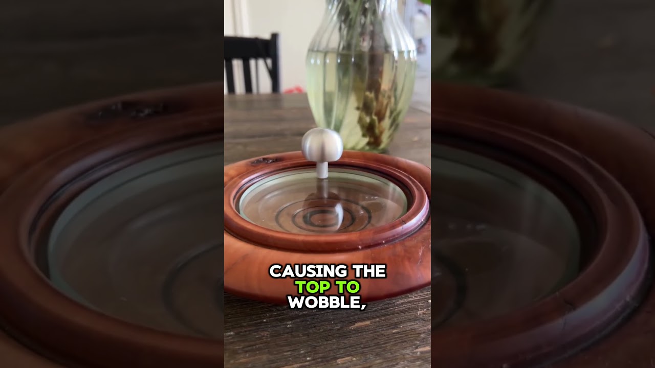 This Spinning Top Defies Gravity! 🤯 spinningtop #shorts #physics #satisfying #usa